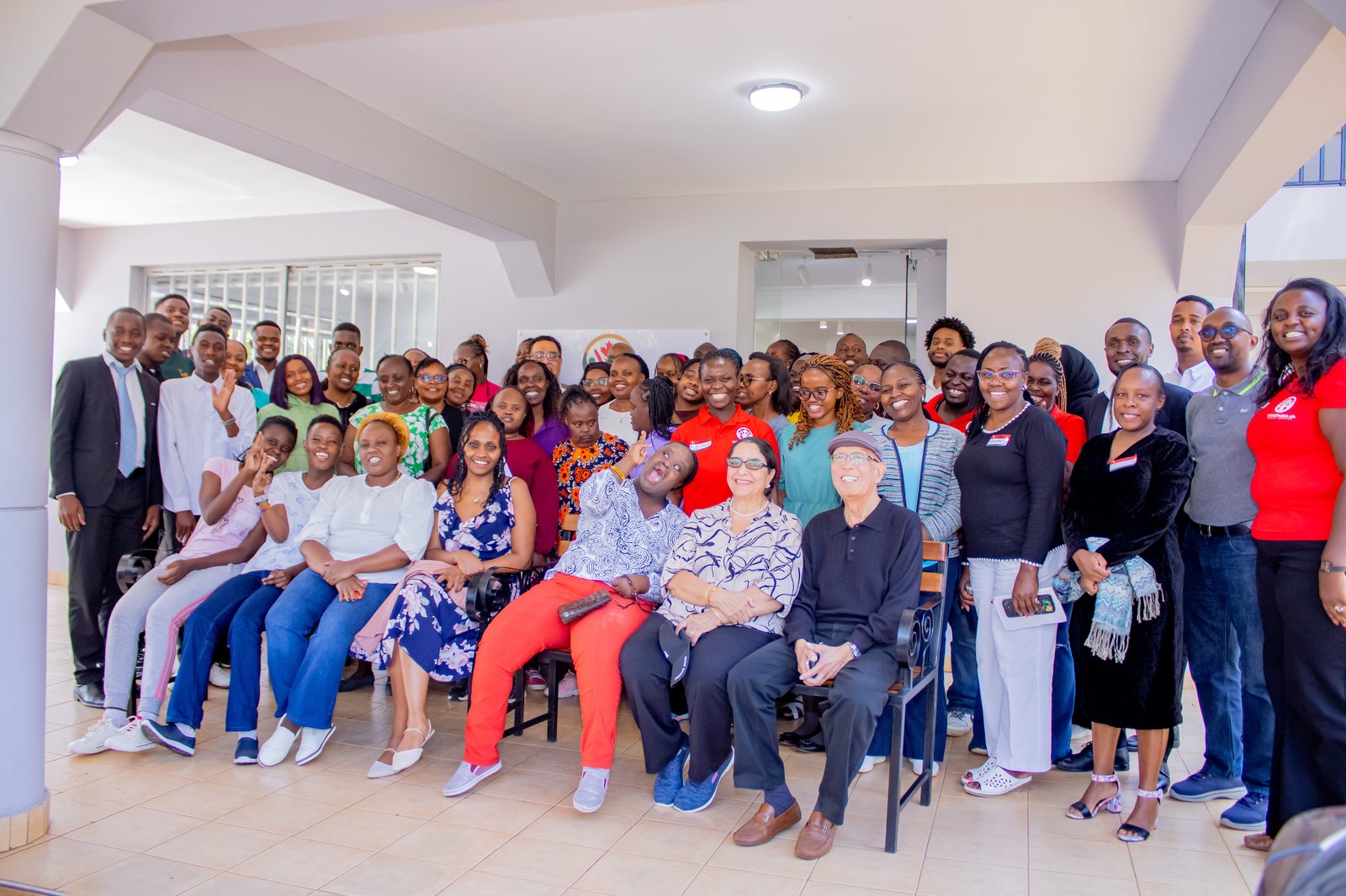 Wider Thrive Pamoja team and community gathered together outdoors